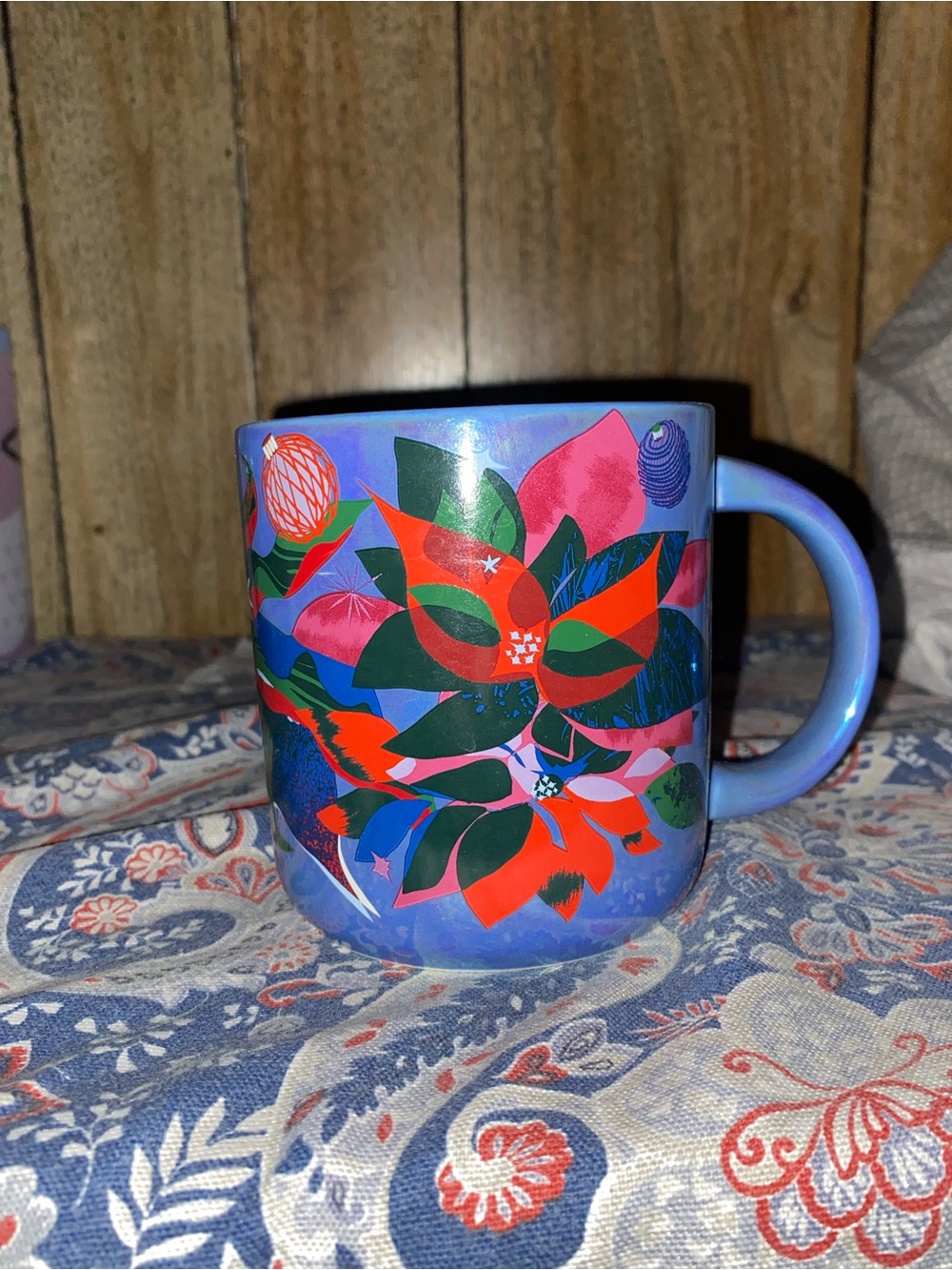 Starbucks Blue Ceramic Mug with Red, Green and Pink Floral Design